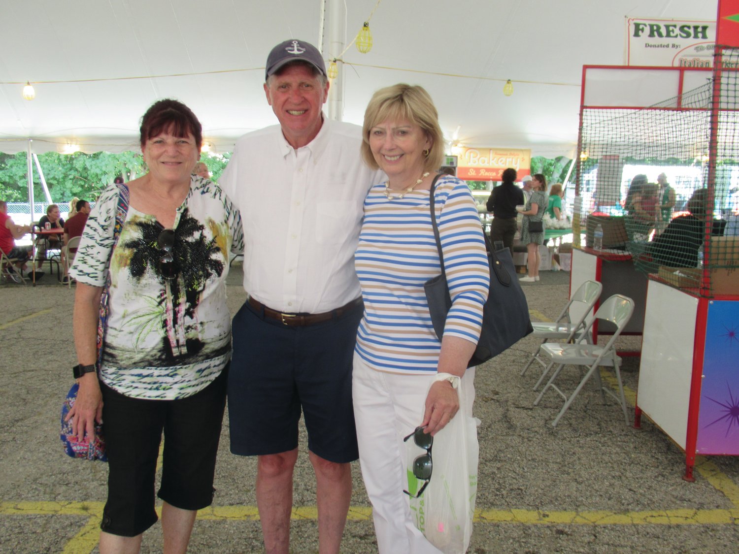 GRAND GUESTS: Gov. Daniel McKee and his wife Susan received warm welcome during Sunday’s Saint Rocco’s Feast and Festival from countless people including Johnston Town Councilwoman Linda Folcarelli.